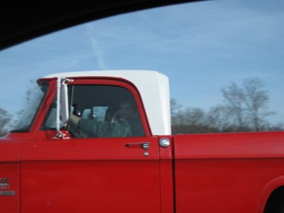 truck riding down road.jpg