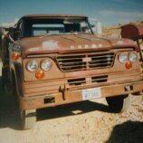 1965 W300 Poly 318 4spd In use sense 1986    If you are wondering what are the repair spots on the hood and below the grill, those are were some one drove by the yard in the middle of the night and unloaded there 9mm.