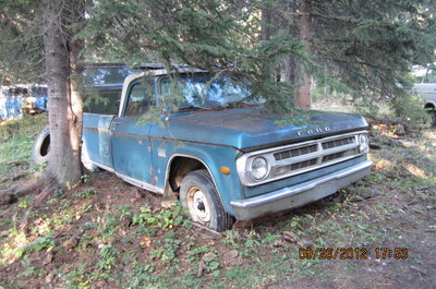 Drayton Valley AB Sweptline resting peacefully in a mopar boneyard.