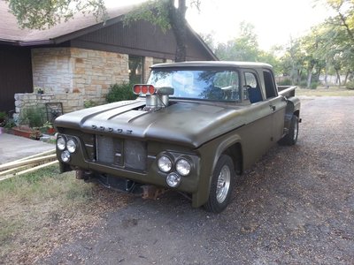 Freshly painted after only 2 years of running around with all that patina.  Still have to install the grill, bumper, and door handles.