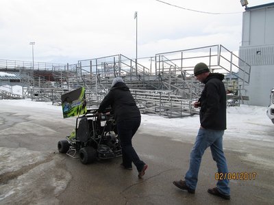 About a 200 yard push through slush, mud and ice to the building. I don't know the genius who thought racing in winter was a good idea, but I would sure like to talk to him/her.