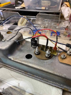 IC connections to the distribution buss and surge capacitor grounded to the housing