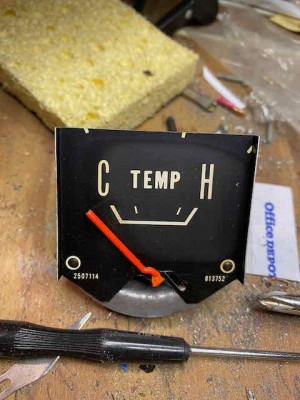 the old burned out temp gauge, notice how much better shape the faceplate is