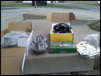 Here are my assembled new parts.  They include rotors, calipers, hubs, pads and Scarebird plates/mounts.