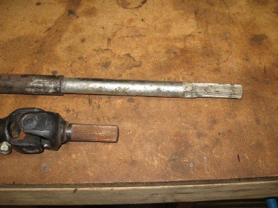 I used the splined section plus about 2&quot; of the '90 shaft (top), and the u-joint from the '01. They were joined using 7/8 ODx.125&quot; wall DOM tubing bored to 11/16 ID.