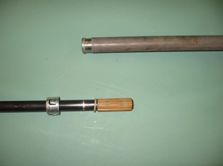 Splined sections of the Ford shaft. Male spline is hard rubber or soft plastic; absorbs vibration and allows flex between the cab/chassis.